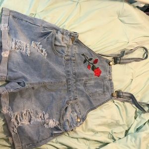 Never worn cute rose overalls.